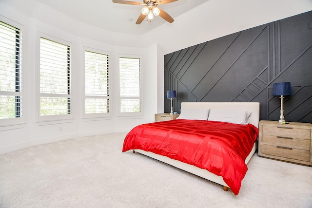 bedroom featuring vaulted ceiling, ceiling fan, and carpet