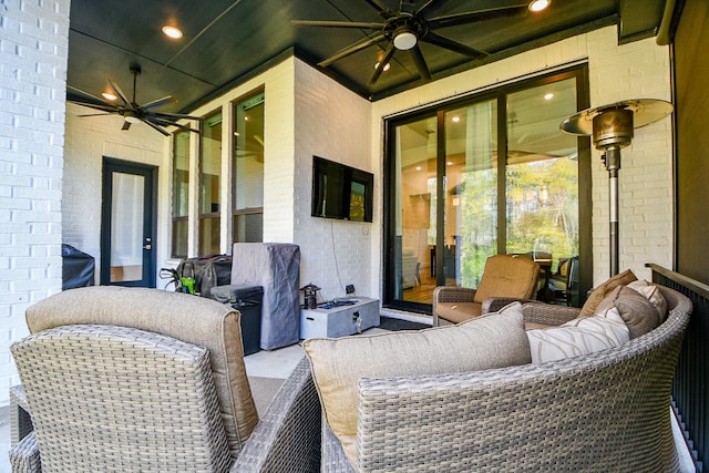 view of patio / terrace with ceiling fan and an outdoor hangout area