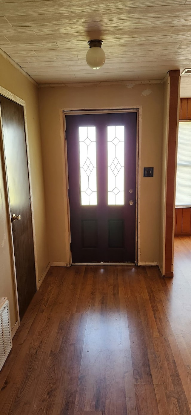 foyer entrance with hardwood / wood-style flooring