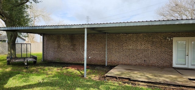 2180 Washington Ave, Alvin, TX 77511 - view of patio / terrace featuring a deck and french doors