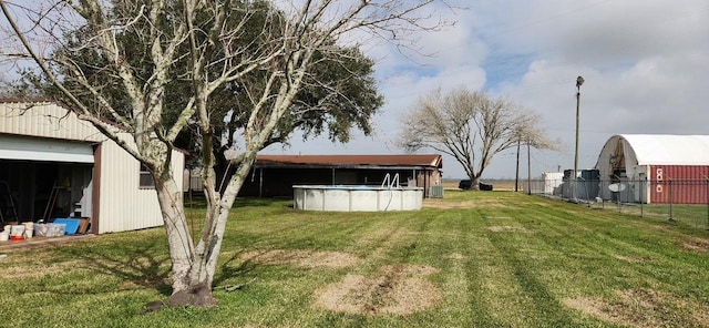 2180 Washington Ave, Alvin, TX 77511 - view of yard with a fenced in pool and fence