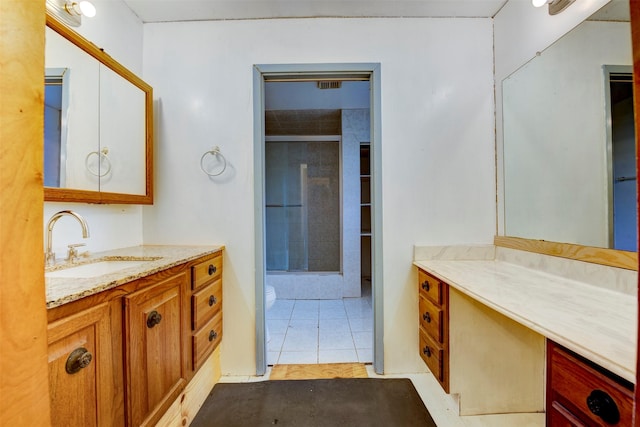 2180 Washington Ave, Alvin, TX 77511 - full bathroom featuring tile patterned floors, toilet, visible vents, and vanity