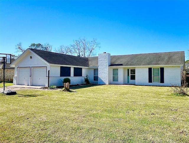 single story home with a garage and a front lawn