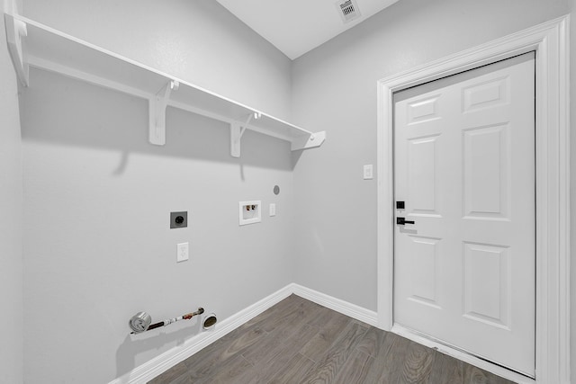 laundry room with hookup for a washing machine, hookup for a gas dryer, dark hardwood / wood-style flooring, and hookup for an electric dryer