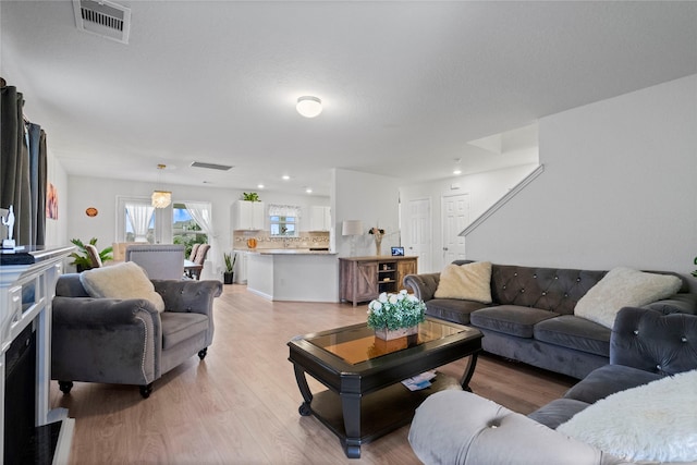 living room with light wood-type flooring