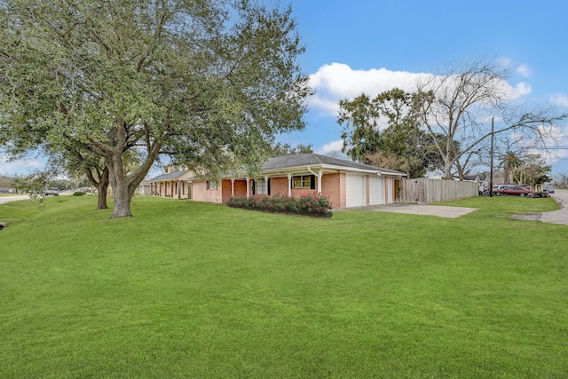 view of yard featuring a garage