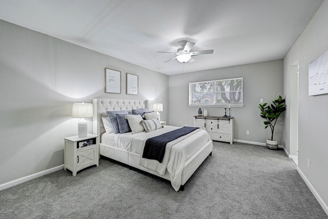 bedroom with ceiling fan and carpet floors