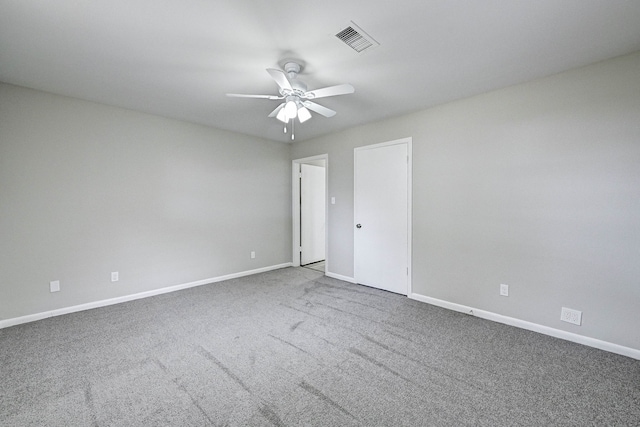 carpeted empty room with ceiling fan