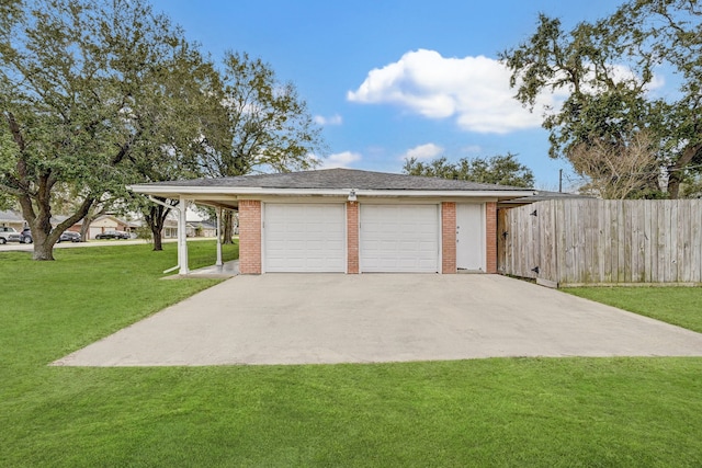 garage with a lawn