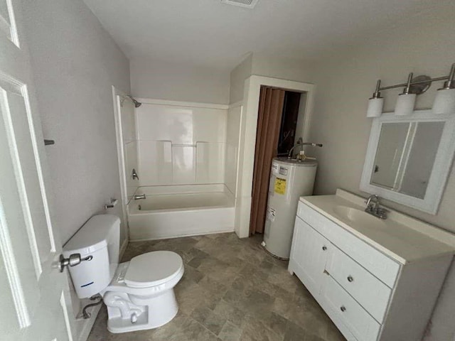 full bathroom with toilet, vanity, water heater, and bathing tub / shower combination