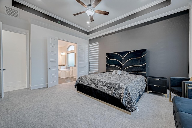 bedroom featuring ceiling fan, carpet floors, ensuite bathroom, and ornamental molding