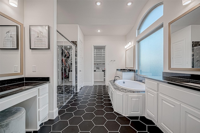 bathroom with vanity and plus walk in shower