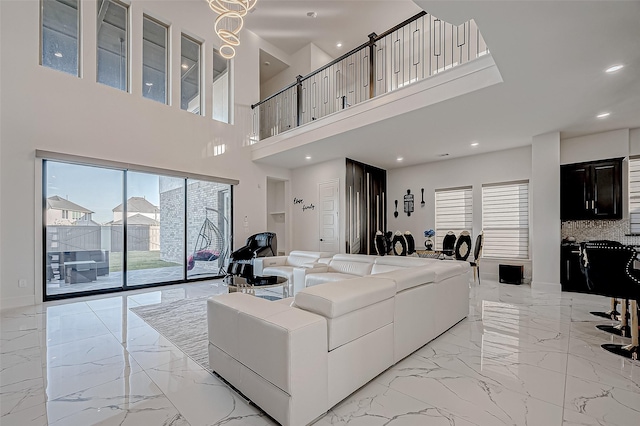 living room with a high ceiling