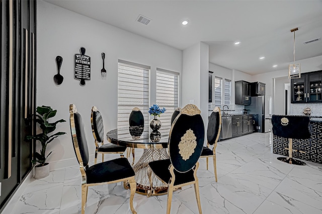 dining room with sink