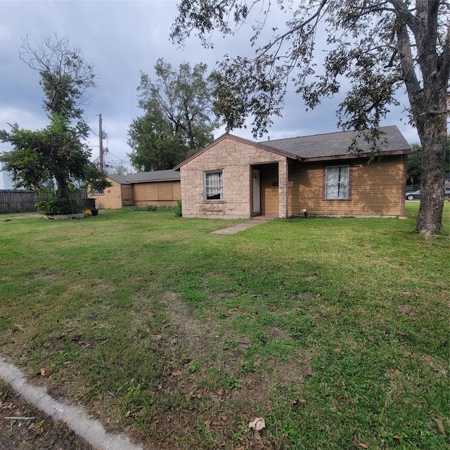 view of front of home with a front yard