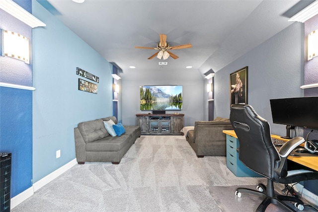 carpeted home office with ceiling fan