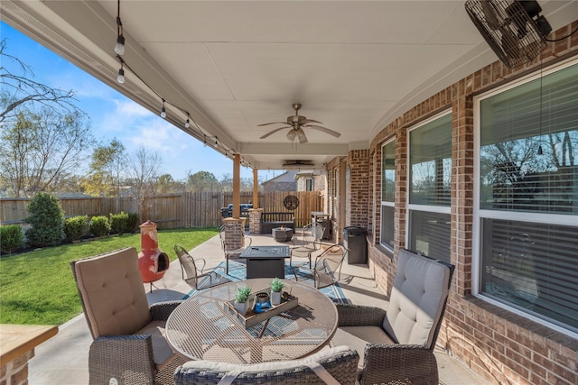 view of patio / terrace featuring ceiling fan