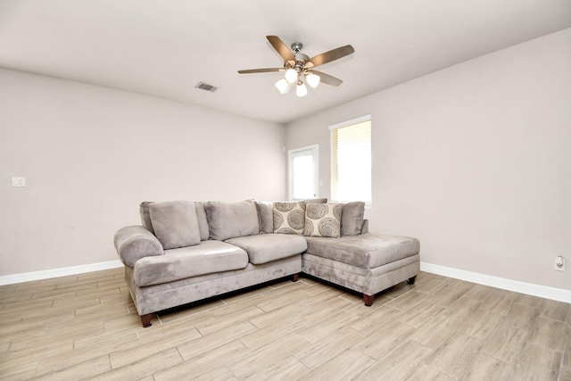 living room with ceiling fan