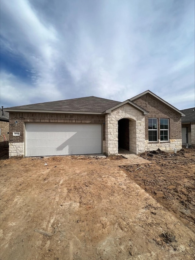 view of front of house featuring a garage