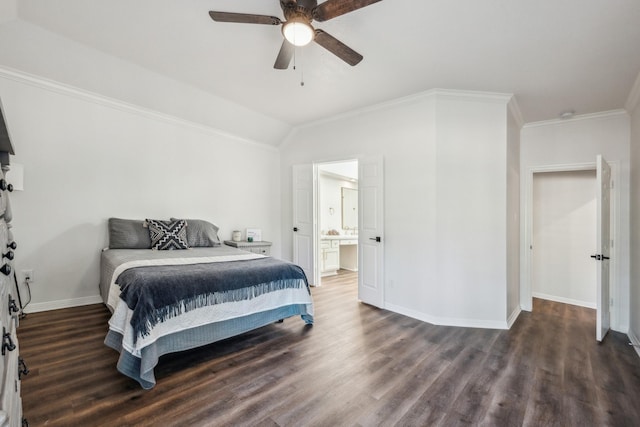 bedroom with ceiling fan, connected bathroom, dark hardwood / wood-style flooring, vaulted ceiling, and crown molding