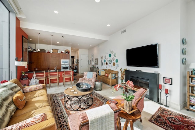 living room featuring sink