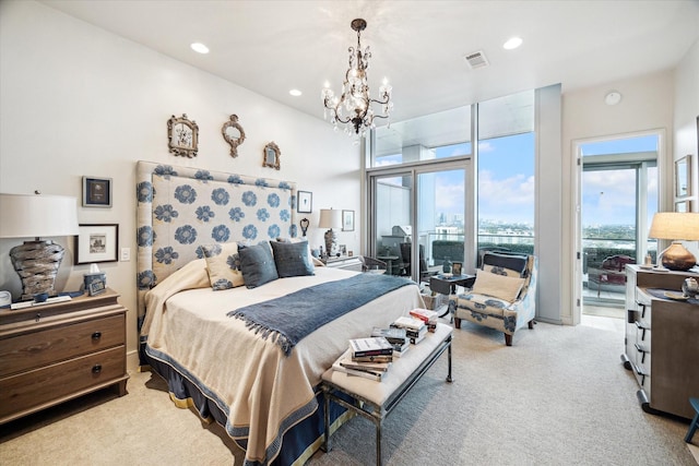 2727 Kirby Dr Unit 13C, Houston, TX 77098 - bedroom featuring light carpet, an inviting chandelier, and access to exterior