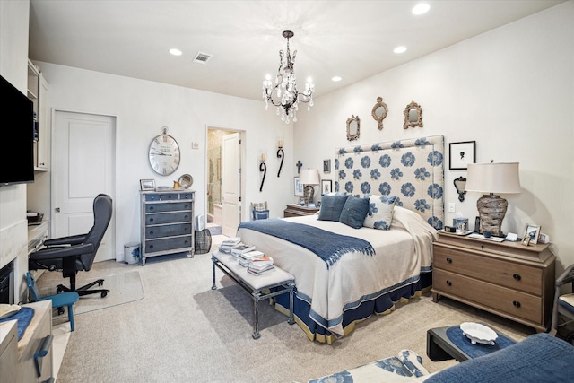 2727 Kirby Dr Unit 13C, Houston, TX 77098 - bedroom with light carpet, ensuite bath, and an inviting chandelier