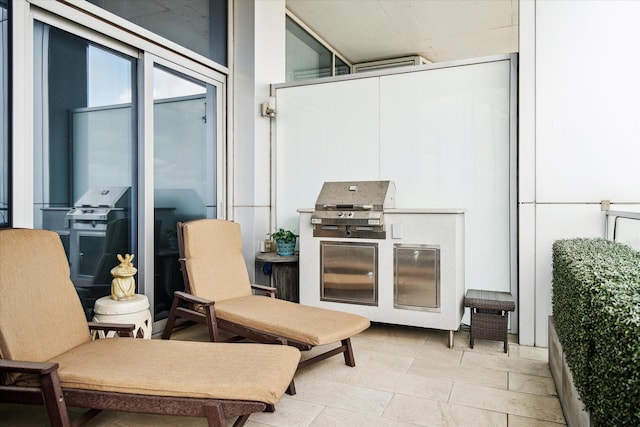 2727 Kirby Dr Unit 13C, Houston, TX 77098 - view of patio with a grill
