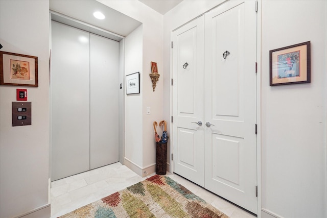 2727 Kirby Dr Unit 13C, Houston, TX 77098 - interior space with light tile patterned floors and elevator