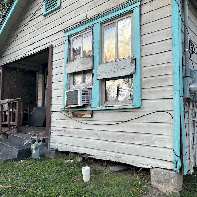 view of home's exterior featuring cooling unit