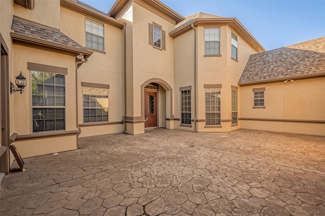 rear view of house with a patio