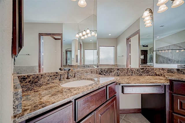 bathroom featuring vanity and tile patterned flooring