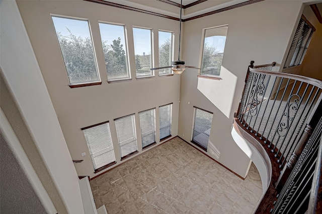 entryway with ceiling fan