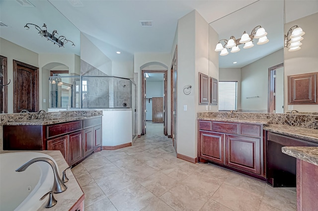 bathroom with plus walk in shower and vanity