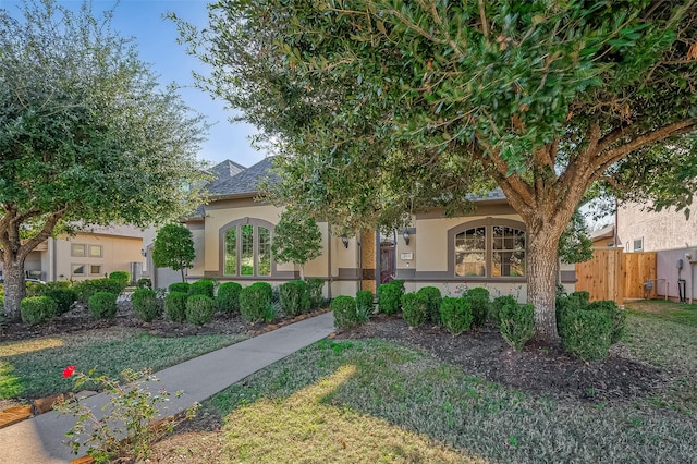 view of front of property with a front lawn