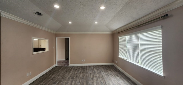 empty room with a textured ceiling, crown molding, dark hardwood / wood-style flooring, and lofted ceiling