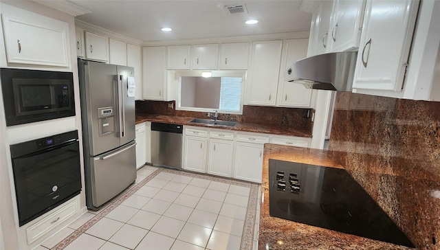 kitchen with light tile patterned floors, white cabinetry, extractor fan, black appliances, and sink