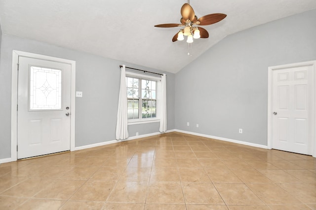 tiled entrance foyer featuring vaulted ceiling and ceiling fan