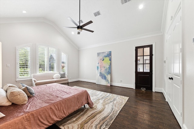 bedroom featuring ceiling fan, vaulted ceiling, dark hardwood / wood-style flooring, and crown molding