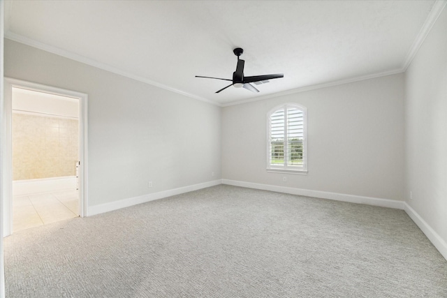 empty room with light carpet, ceiling fan, and ornamental molding