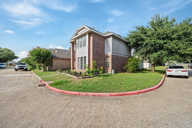 view of property exterior featuring a lawn