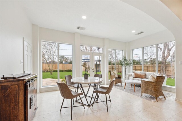 sunroom / solarium with french doors