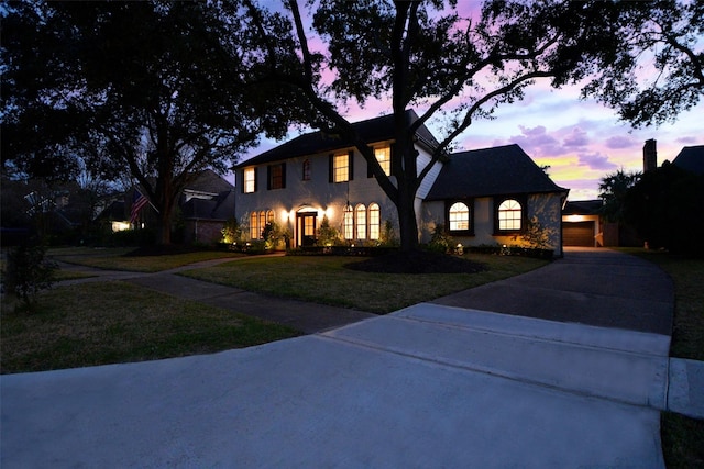 view of front of home with a yard