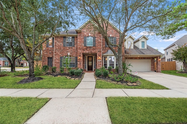 view of front facade featuring a front yard and a garage