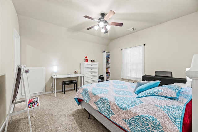 carpeted bedroom featuring ceiling fan and lofted ceiling