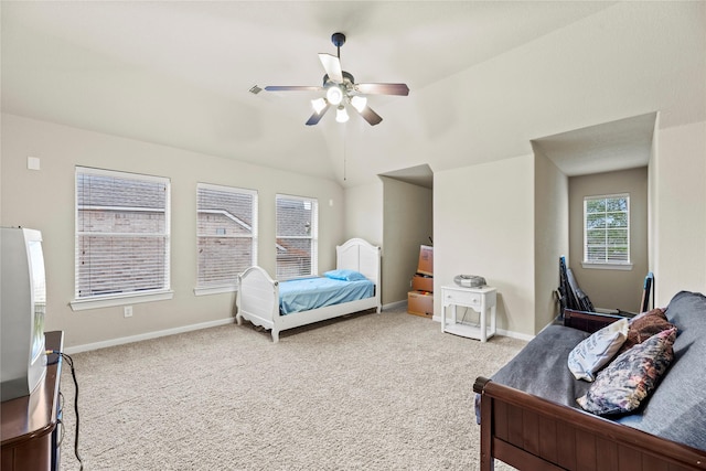 bedroom featuring ceiling fan and carpet