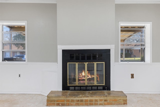 details featuring a brick fireplace