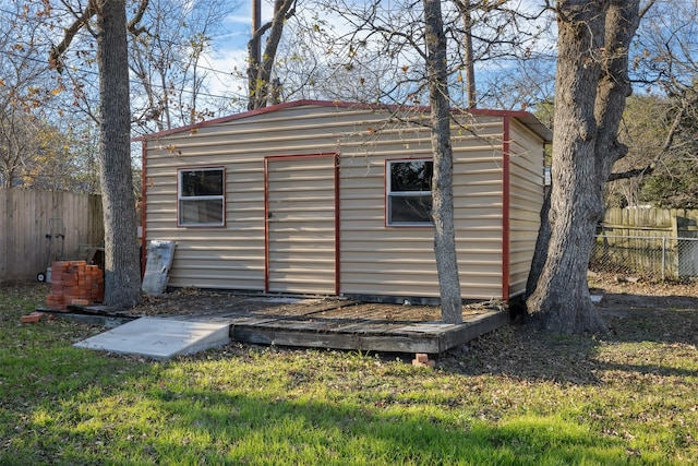 view of outdoor structure featuring a yard