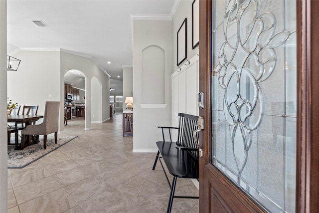 foyer with ornamental molding