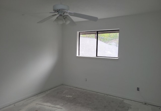 spare room with ceiling fan